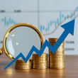 © MdZamal - Magnifying glass on growing stacks of gold coins with upward trend arrow isolated on transparent background