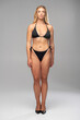 © alipko - Studio model digitals of blonde female in black lingerie showing natural poses and physique for model agency