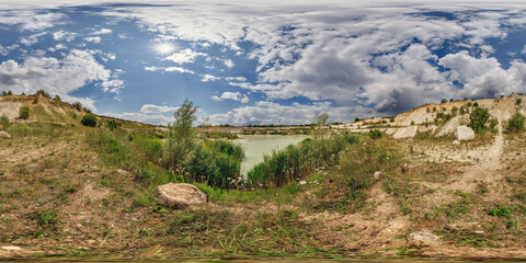 Wall Mural - full seamless 360 hdri panorama near quarry flooded with water for sand extraction mining in sunny day with cloudy sky in equirectangular spherical projection for VR AR content