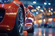 © juliars - Close up of a red sports car gleaming under showroom lights, capturing the excitement of an auto exhibition