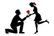 © Samrat - A lover is proposing to his girlfriend on one knee with a red rose.