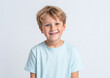 © Graphic Pro - Smiling boy looks at the camera against a white background. Marketing, web, design.