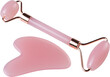 © Budjak Studio - Pink Gua Sha massage tool on a white background, close-up. Rose Quartz jade roller.