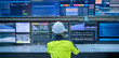 © reewungjunerr - Engineer working at control room, Manager control system, Technician man monitoring program from a lot of monitor.Specialist observes analytics dashboard,operator inspects digital interface