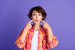 © deagreez - Portrait of nice young lady fingers press cheeks wear shirt isolated on purple color background