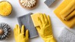 © TesaI - Housekeeper preparing cleaning supplies on white table