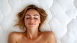 © VirtuLens - Young woman peacefully sleeping on soft mattress in cozy setting
