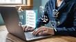 © Muhammad - Attorney uses laptop for legal research and online case management