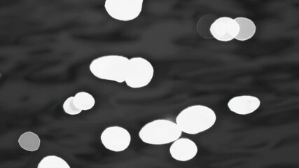 Wall Mural - bokeh light dance: abstract glowing shapes in motion with smooth transitions