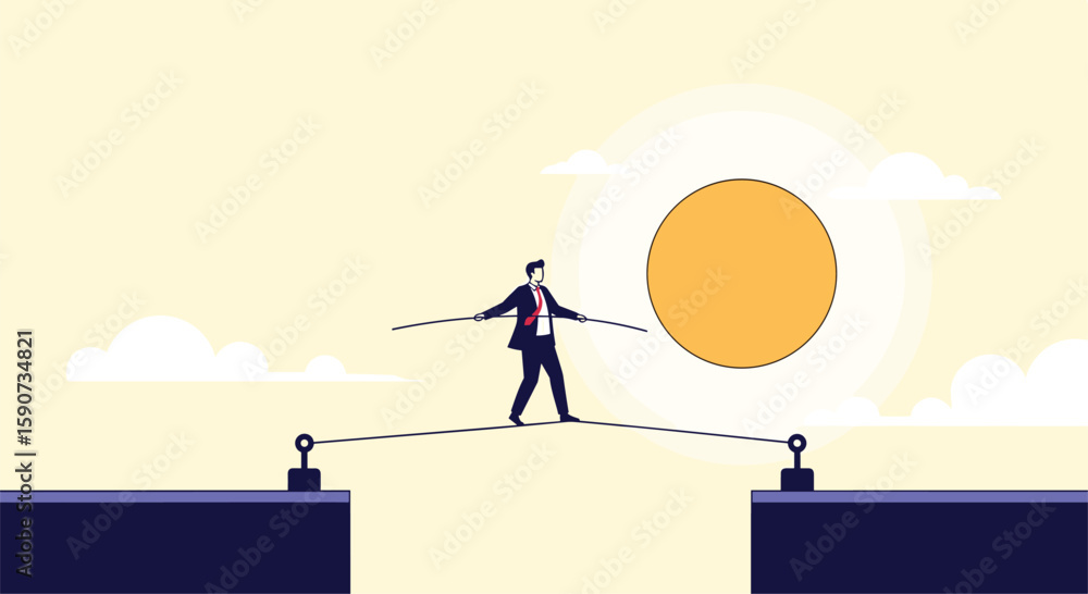 Businessman walking on a tightrope over a gap with the sun behind him ...