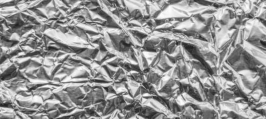 Wall Mural - shiny metal silver gray foil leaf crumpled texture background