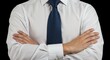 © Sayam - Confident businessman wearing a crisp white dress shirt and a textured dark blue tie with arms crossed against a black background