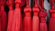 © Cantika - Close-up of many vibrant red tassels