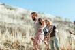 © Marko Geber - Young and diverse group of friends and hikers hiking together in the mountains of south africa