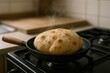 © Generative AI - Freshly Baked Bread Rising in a Black Skillet on a Modern Gas Stove Kitchen.