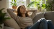 © Zohaibzahid  - Peaceful Woman Enjoying a Moment of Serene Relaxation on a Sofa in a Sunlit Room, Healthy life style, good vibes people and new home concept