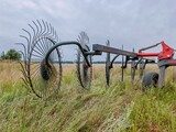 Agricultural machinery, wheel-finger rake. close-up. tractor-mounted rakes