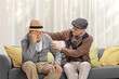 © Ljupco Smokovski - Elderly man comforting his sad friend