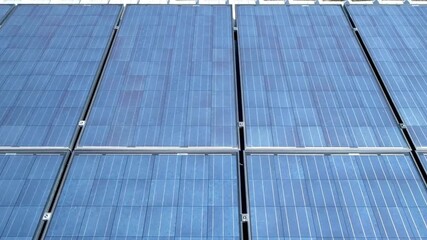 A close up view of a blue solar panel array