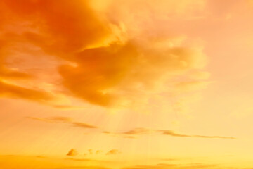 Wall Mural - orange sky with clouds during hot summer weather
