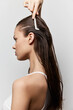© SHOTPRIME STUDIO - Hair styling, beauty, model with long wet hair, combing, side profile, minimalistic background, natural look, professional portrait, hair care concept, beauty routine