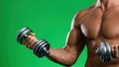 © OleksandrZastrozhnov - Young male lifting dumbbell against green background