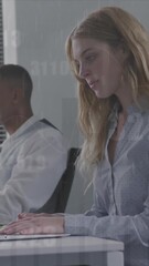 Sticker - animation of statistics and data processing over diverse business people working in office