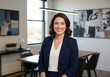 © Yhs City - Confident Businesswoman Smiling at Camera in Modern Office