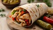 © jaha - Freshly Wrapped Chicken Shawarma with Vegetables and Herbs