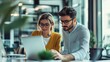 © Fiverr/fazilazia703 - Senior female professional helps young man on computer in meeting room, working together on company tech project in modern office interior with copy space for business message