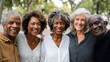 © Kevin - Group of Diverse Happy Seniors Embracing Friendship in Urban Park