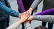 © MST - Diverse group of people joining hands in a circle for support and teamwork