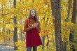 © Volodymyr - Relaxing in nature. Woman enjoy nature alone. Nature is source of power for her. Natural beauty. Autumnal melancholy. Pretty woman stand nature forest background. Fall fashion. Enjoy fall season