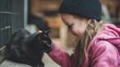 © AI_Vision - A young child gently petting a sleek black cat at a shelter on adoption day under warm natural lighting
