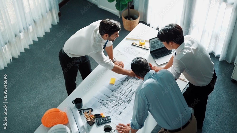 Top view of professional architect engineer team writing sticky notes ...