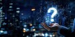 © FocusFusion - A hand holds the key to questions in the night city
