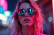 © miss irine - Woman with vibrant pink hair wears trendy red sunglasses, reflecting neon lights. Stylish portrait captures bold fashion attitude with chromatic colors, blurred city background. Glamorous look for