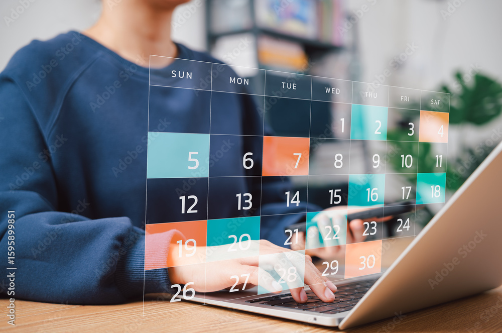 Scheduling Using A Computer Calendar Scheduling for Personal and Work Organization. Woman using ...
