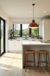 © Theerawat - Bright open-plan kitchen, breakfast bar seating, sleek, monochrome