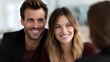 © Thares2020 - Smiling couple consulting with real estate agent in bright modern office