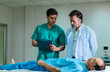 © SpaceOak - Doctor Examining Patient in Emergency Room