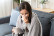 © Pormezz - Women have the flu and a runny nose, and feel sick and cold.