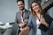 © Migma_Agency - Business people shaking hands at conference meeting