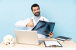 © luismolinero - Professional traumatologist in workplace giving a thumbs up gesture