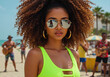 © Vasiliy - African American woman with curly afro hair in neon green swimsuit and mirror sunglasses on sunny beach