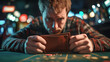 © komgritch - A man intently examines an empty wallet at a casino table, expressing concern and financial worry under colorful, blurred gambling lights.
