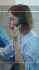 Sticker - animation of data processing over diverse business people using phone headphones in office
