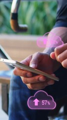 Sticker - animation of clouds with arrows and percent going up over caucasian man using smartphone