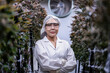 © ultramansk - A scientist inspects cannabis plants in a controlled indoor farm for quality assurance and research. Medical marijuana cultivation advances through innovation, biotechnology, and sustainability.