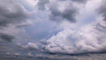 Wall Mural - dark sky with stormy clouds. dramatic sky rain,dark clouds before a thunder-storm,clouds before rain